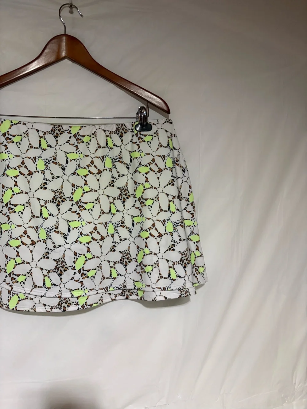 Cross court Floral Cutout Tennis Skort in White with Neon Yellow Accents
